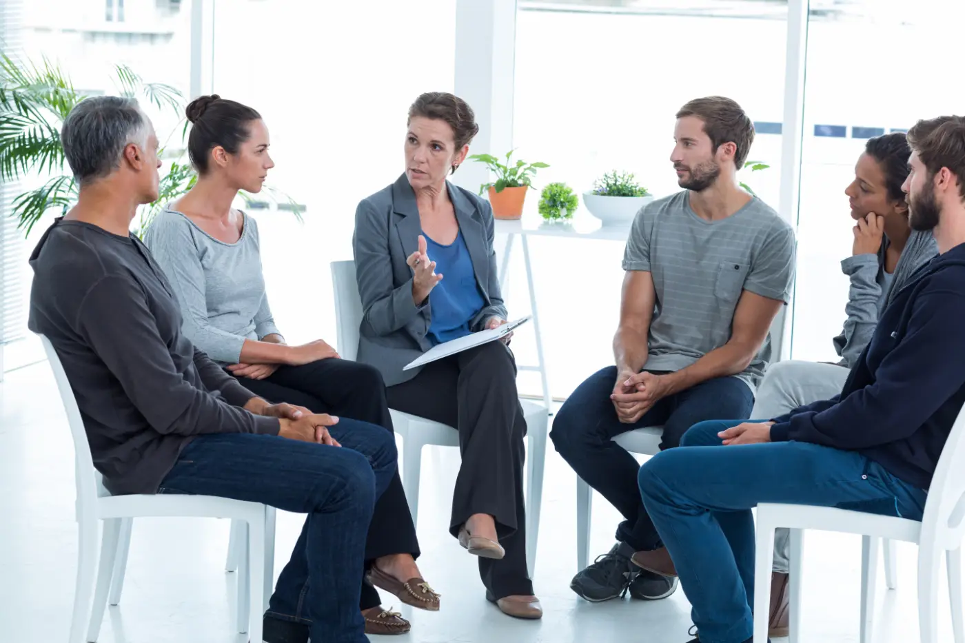 Counsellor chairing a group session